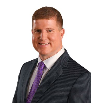 Portrait of Drew Fellios, REALTOR®.
